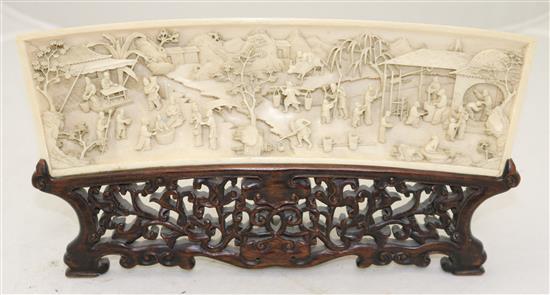 A fine Chinese ivory fan-shaped panel, late 19th/early 20th century,